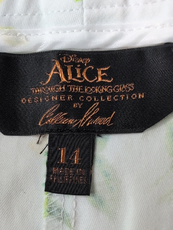 Disney Alice Floral Print White Crop Pants with Green and Orange Accents - Picture 2 of 9